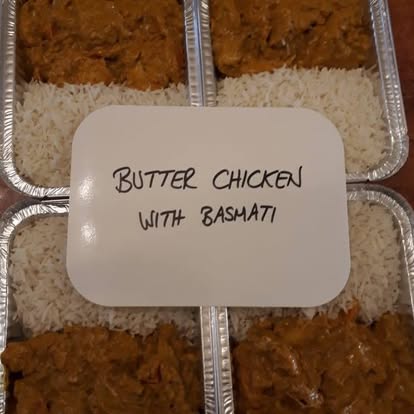 Butter Chicken mild aromatic curry with carrots, served with basmati rice